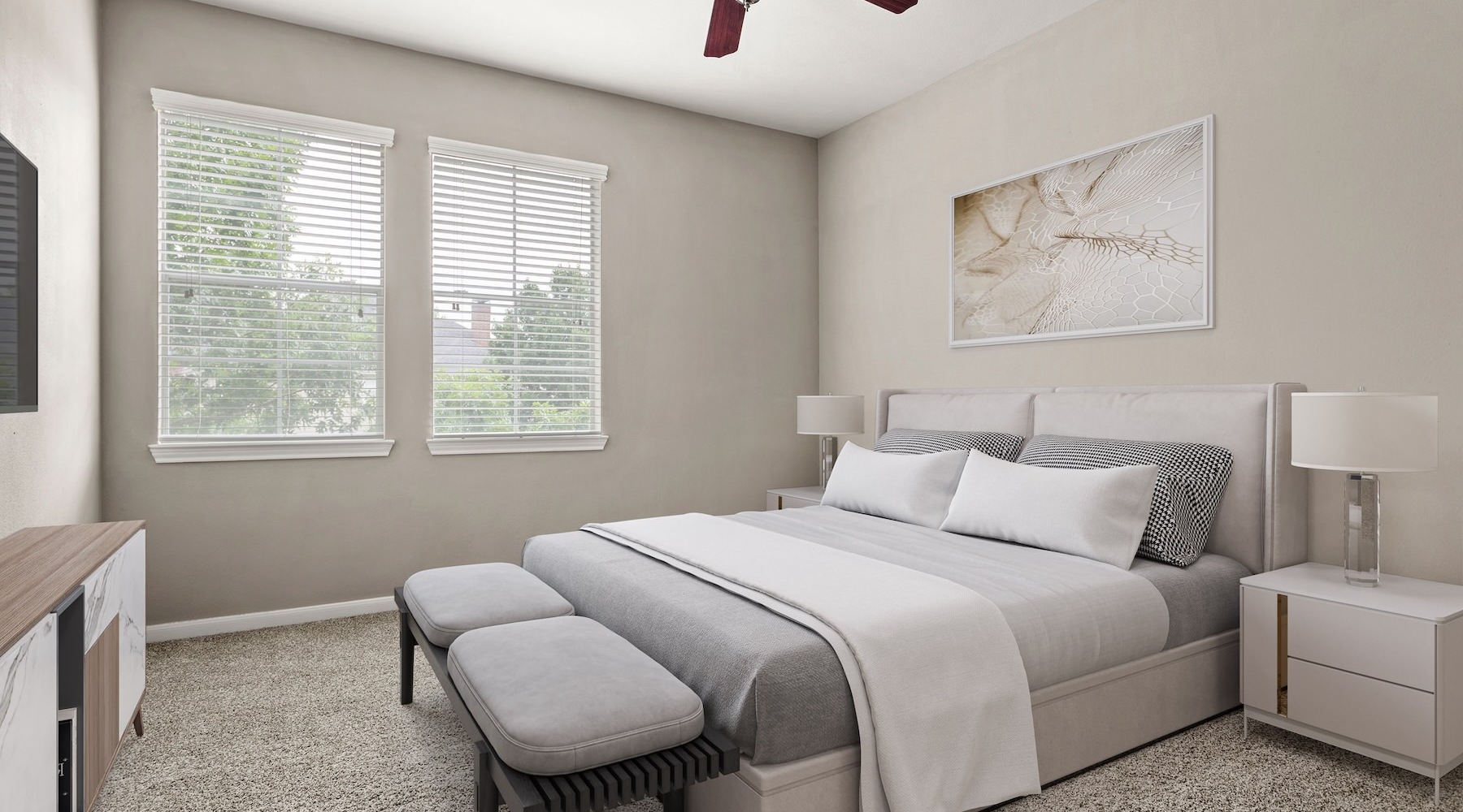 a bedroom with a bed and a fan