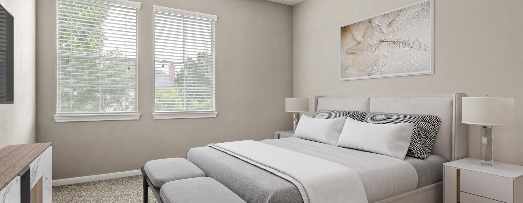 a bedroom with a bed and a fan