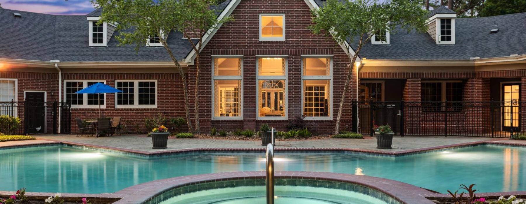 a large house with a pool